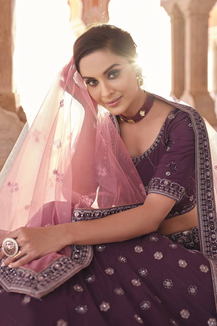 Hypnotizing Wine dori and thread embroidered with zarkan crepe designer Lehenga choli