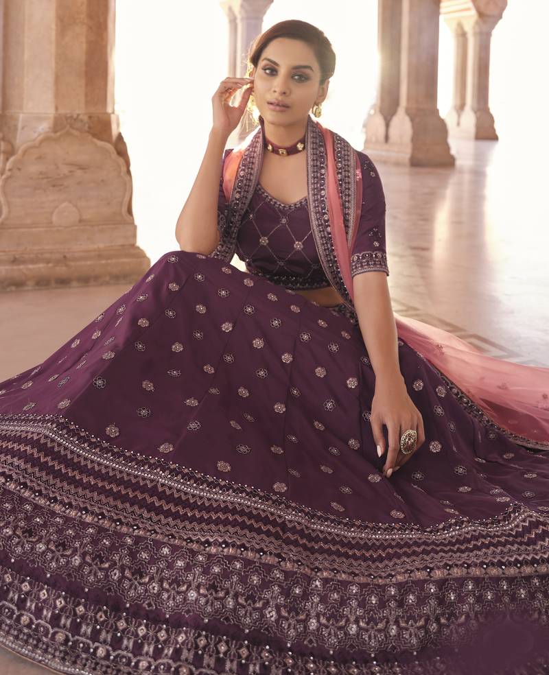 Hypnotizing Wine dori and thread embroidered with zarkan crepe designer Lehenga choli