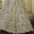 Spanish Green Thread, zari, dori and Sequins embroidered net semi stitched Bridal lehenga