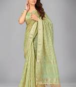 Light green woven silk saree with blouse