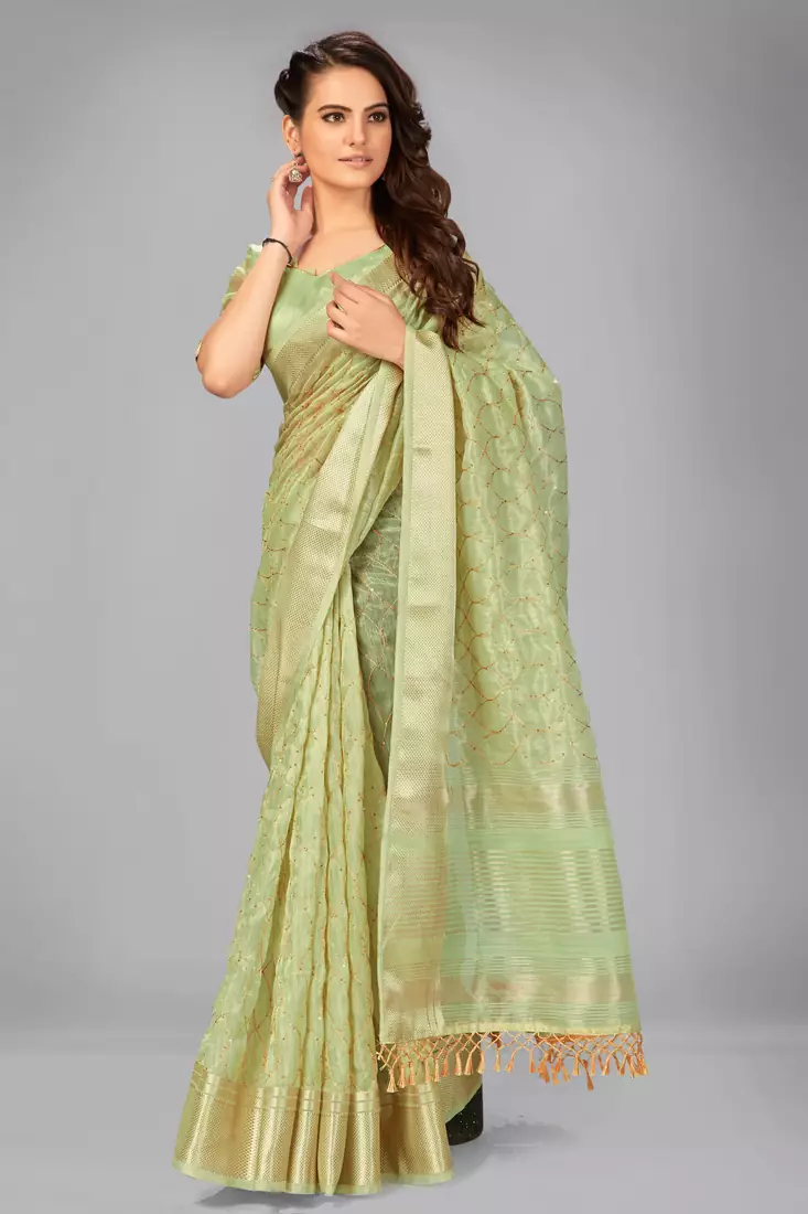 Light green woven silk saree with blouse