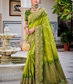 Parrot green woven silk saree with blouse