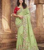 Parrot green embroidered organza saree with blouse