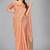 Peach woven silk saree with blouse