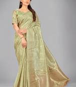Light green woven silk saree with blouse