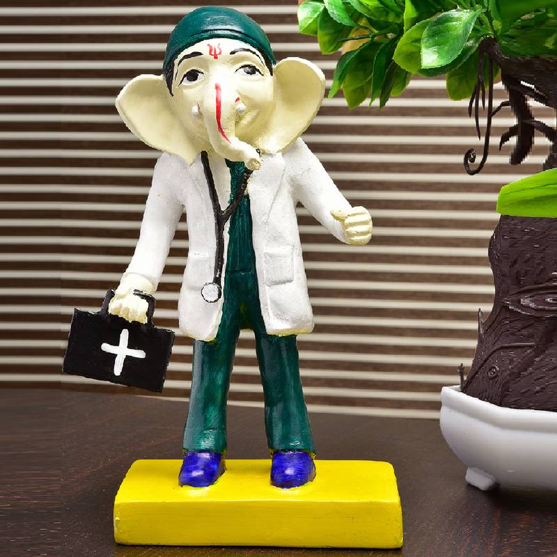 Karigaari Handcrafted Polyresin Ganesha Beautiful Doctor Lord Ganesh Idol