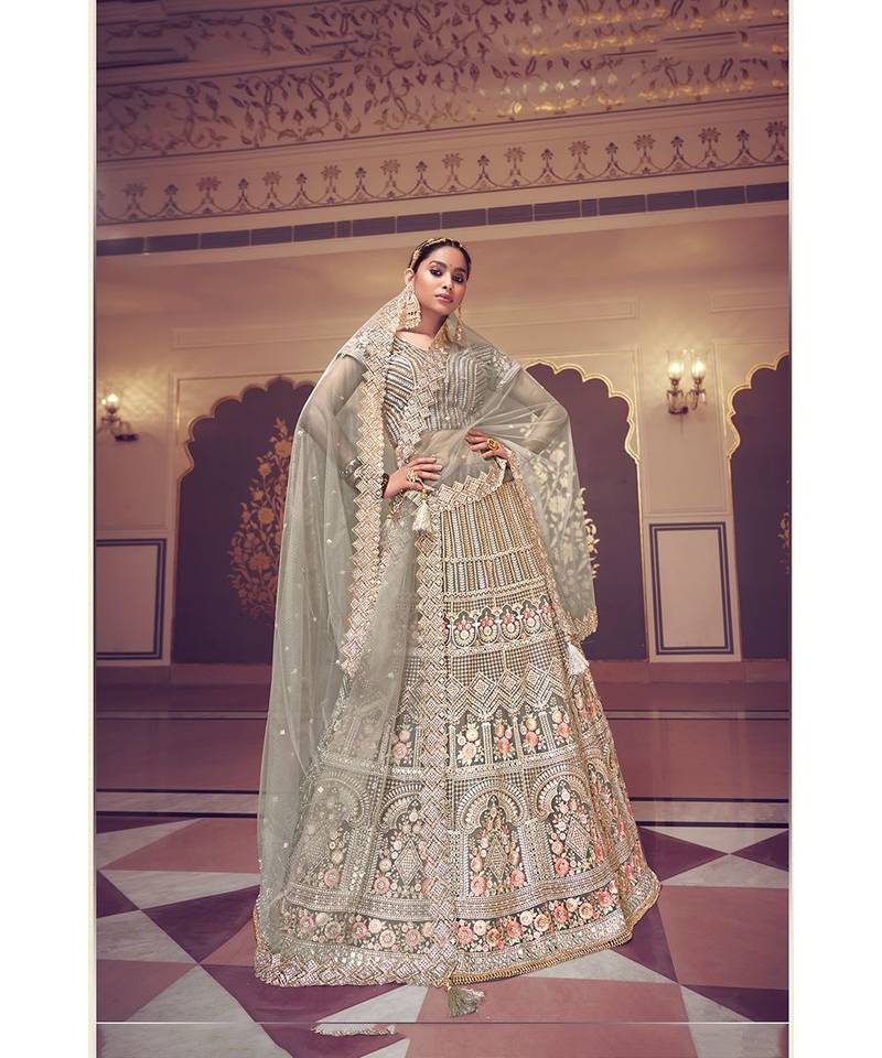 Nakkashi Greyish Colour net lehenga having mirror work on
