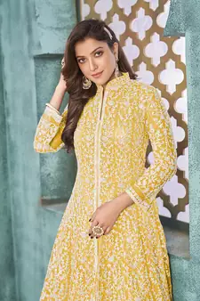 Yellow embroidered net salwar kameez