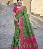 Green embroidered banarasi silk saree with blouse