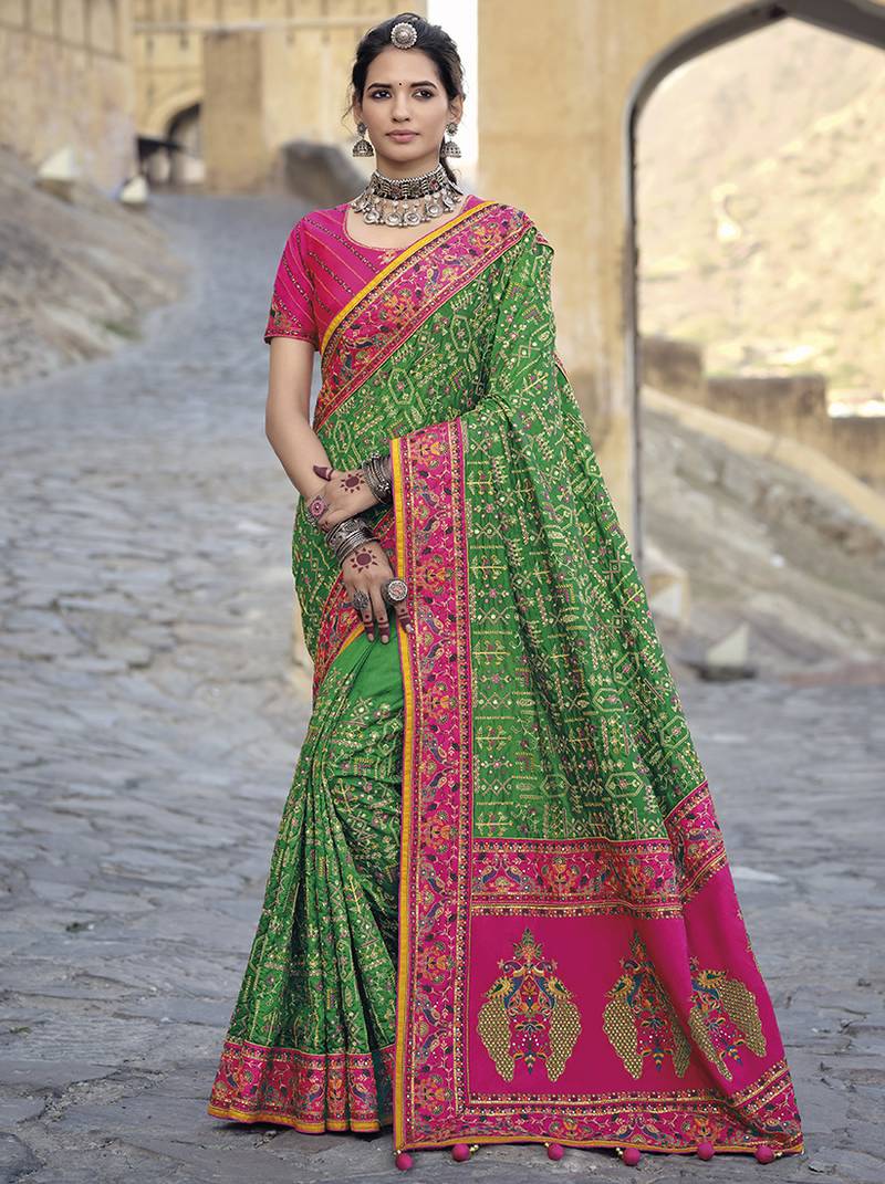 Green embroidered banarasi silk saree with blouse