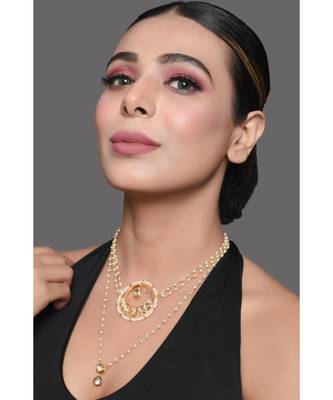 Sleek moon shaped kundan inspired choker teamed with pearl beaded necklace 1