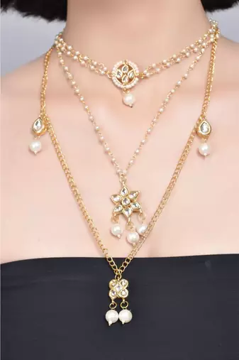 Multilayered Pearl Beaded Kundan Embellished Necklace Teamed With Choker