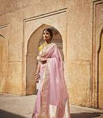 Light pink woven silk saree with blouse