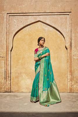 Green woven silk saree with blouse 1