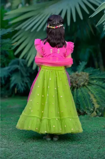 fuchsia pink and green hand embroidered zari work lehenga