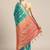 Turquoise woven crepe saree with blouse