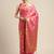 Pink woven crepe saree with blouse