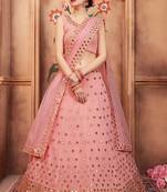 peach color mirror work lehenga choli with net dupatta