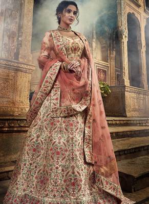 Jute white color cutdana work lehenga choli with net dupatta 1