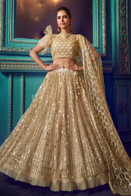 Awesome Dusky Beige Color Soft Net Semi Stitched Lehenga Choli with Sequins & Ruffle Work 1