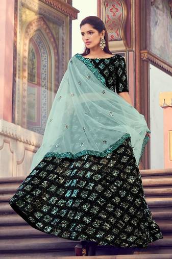 Gorgeous black color lehenga choli with green dupatta