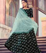 Gorgeous black color lehenga choli with green dupatta