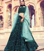 Dashing black color lehenga with turquoise blue dupatta