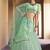 super cool sea green colored soft net base stylish lehenga choli