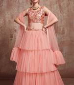 Charming peach Soft Net Base Ruffle Lehenga Choli