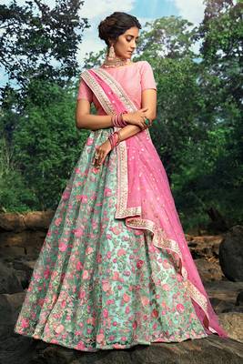 Mesmerizing Baby pink And Sea green Soft Net Base Embroidered Lehenga Choli 1