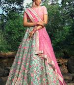 Mesmerizing Baby pink And Sea green Soft Net Base Embroidered Lehenga Choli