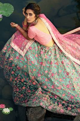 Mesmerizing Baby pink And Sea green Soft Net Base Embroidered Lehenga Choli 2