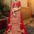 Incredible red velvet base embroidered bridal lehenga choli