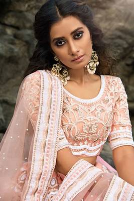 Fabulous peach pink Soft Net Base Designer Ethnic Lehenga Choli 3