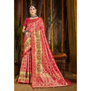 Pink woven silk blend saree with blouse 1