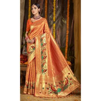 Orange woven silk blend saree with blouse 1