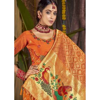 Orange woven silk blend saree with blouse 2