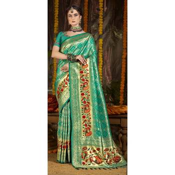 Green woven silk blend saree with blouse 1