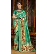 Green woven silk blend saree with blouse
