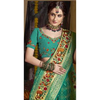 Green woven silk blend saree with blouse 2