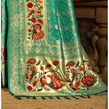 Green woven silk blend saree with blouse 3