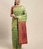 Green woven banarasi silk saree with blouse