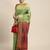 Green woven banarasi silk saree with blouse