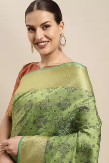 Green woven banarasi silk blend saree with blouse