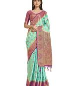 Green woven crepe saree with blouse