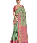 Green woven art silk saree with blouse