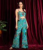 Turquoise Jumpsuit With A Mirror Embroidery