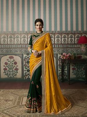 yellow premium embroidered fancy fabric traditional saree with un-stitched blouse fabric 1