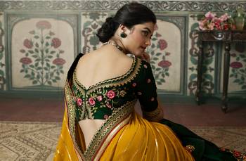yellow premium embroidered fancy fabric traditional saree with un-stitched blouse fabric 3