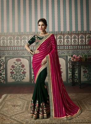Rani pink premium embroidered fancy fabric wedding saree with un-stitched blouse fabric 1